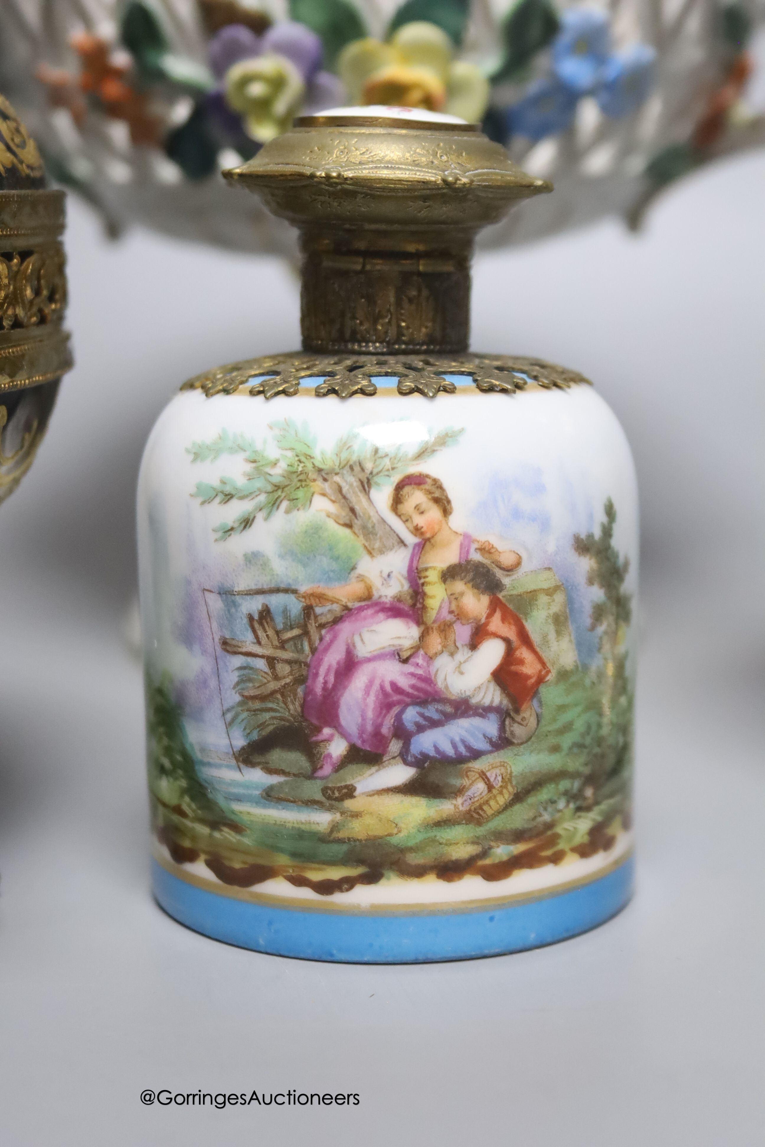 A Sevres style ormolu-mounted bowl and cover, a similar lidded vase and a scent bottle, tallest 22cm